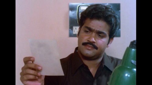 Kariyilakkattu-Pole-1986---1080p---WebDL---AVC---AAC---ESub-DDR.mkv_snapshot_00.35.48.jpg